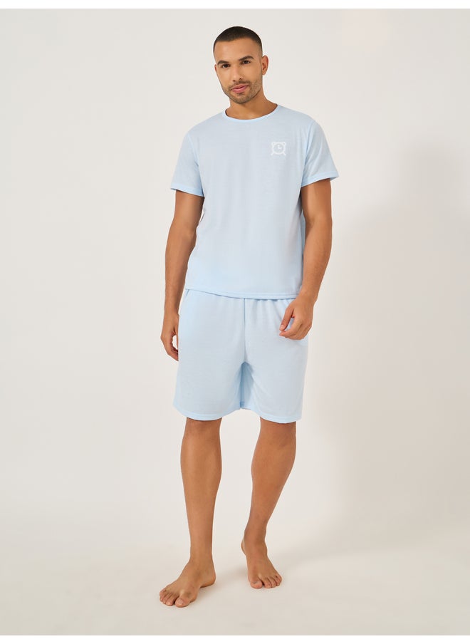 Styli Styli Unwind Slogan Front and Back Printed T-Shirt and Shorts Set  - Image 1