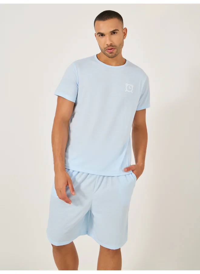 Styli Styli Unwind Slogan Front and Back Printed T-Shirt and Shorts Set