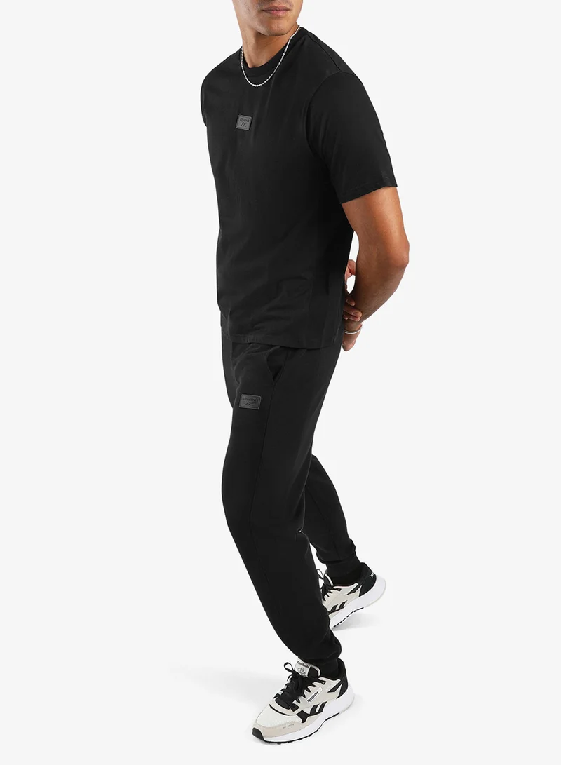 Reebok  Silicone Badge T-Shirt for Men | Best Price UAE