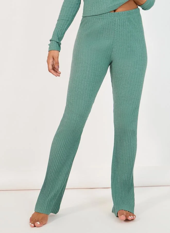 Styli Brushed Rib Wrap Tie Top & Flared Trouser Lounge Set