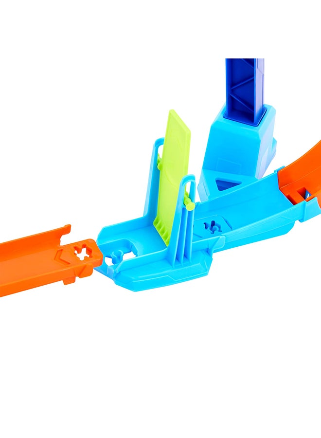 Hot Wheels Toy Car Track Set, Flip & Jump Through the Corkscrew Loop with a 1:64 Scale Toy Car, Speed Snap Track & Adapters, Compresses for Storage - Image 5