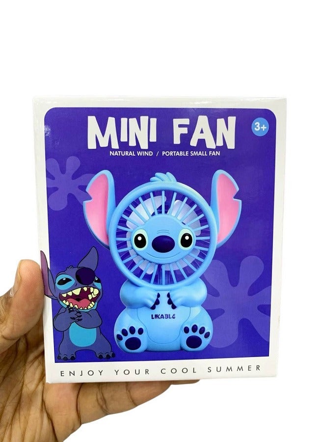 STITCH مروحة صغيرة محمولة على شكل خياطة، صغيرة الحجم وسهلة الحمل باليد أو وضعها في الحقيبة، مزودة ببطارية قابلة للشحن مع منفذ USB، وزر تشغيل/إيقاف و3 سرعات هواء زرقاء - Image 2