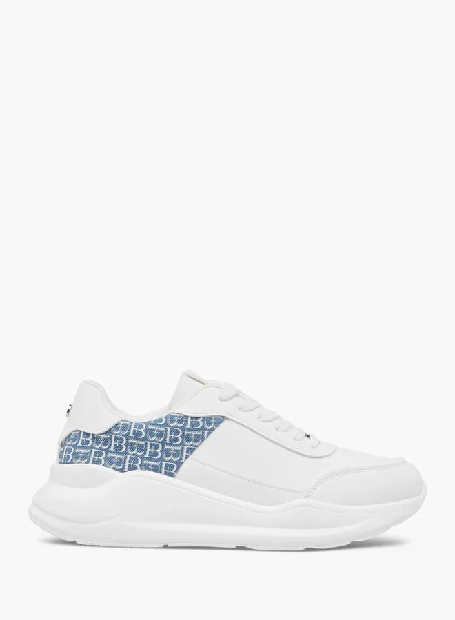 فلورا بيلا من شو إكسبرس سنيكرز نسائي بنقشة المونوغرام بنعل سميك وإغلاق برباط