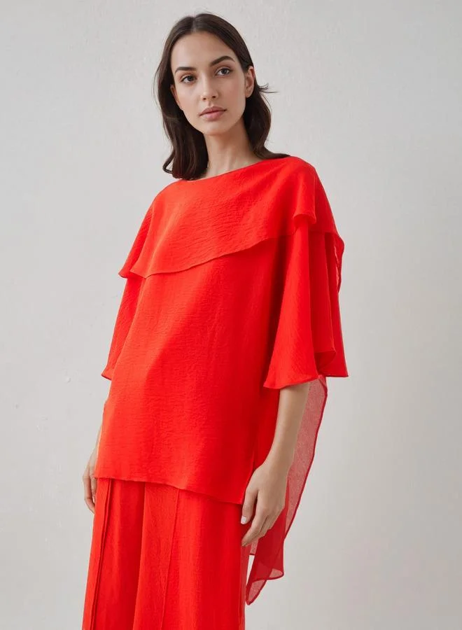 ايكونيك توب أنيق بياقة دائرية وطبقة علوية متدلية