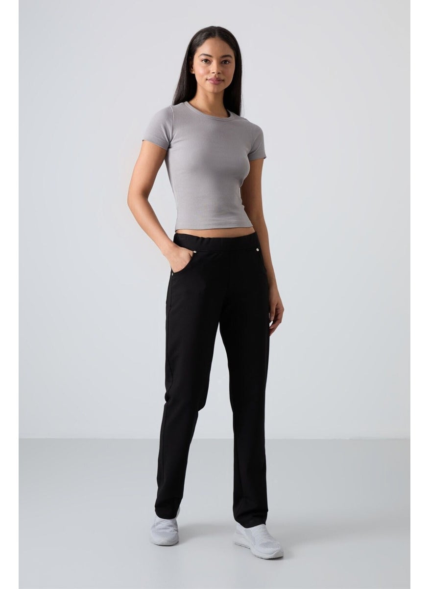 Tommy Life Black Women's Pants Tracksuit Bottom  - Image 1