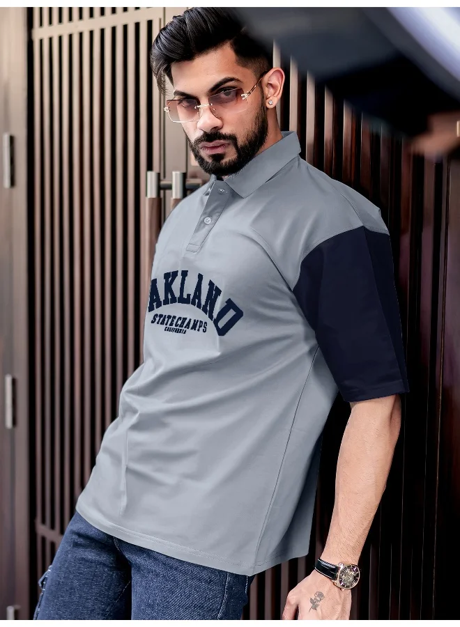 مانياك تيشيرت قطن مقاس كبير رجالي بياقة بولو مطبوعة وأكمام 3/4 باللون الرمادي الفاتح والكحلي