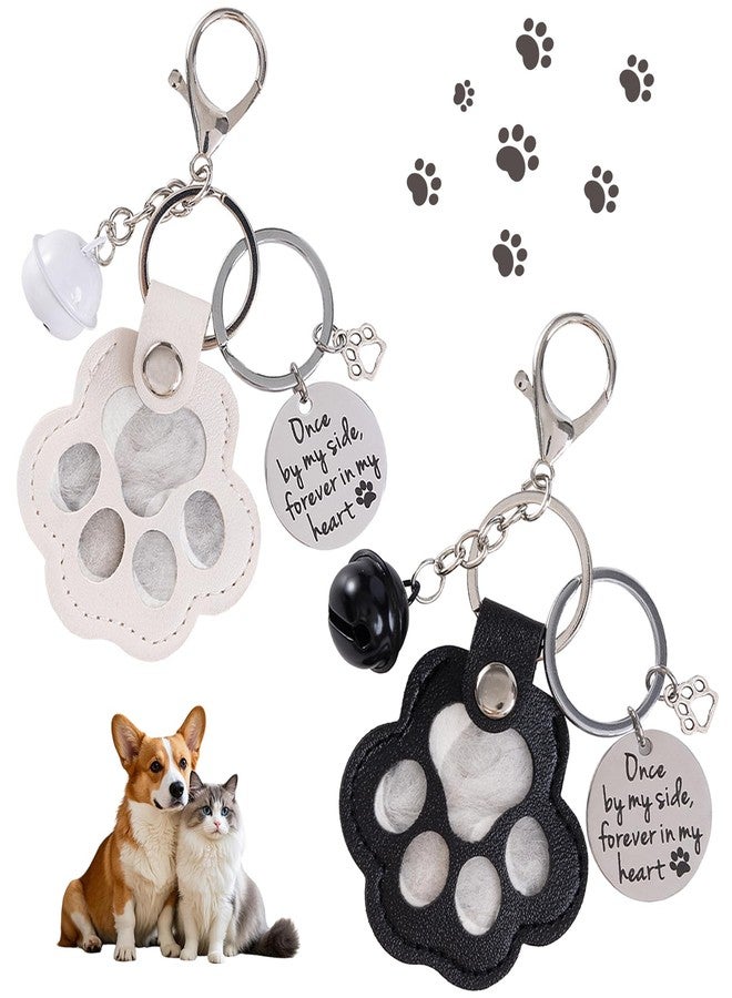 iSamzan 4Pcs Leather Dog Memorial Keychain: Pet Paw Print Fur Keepsake - Cute Dog Cat Paw Shaped Furever Keychain for Hair Storage (Black & White) - Image 1