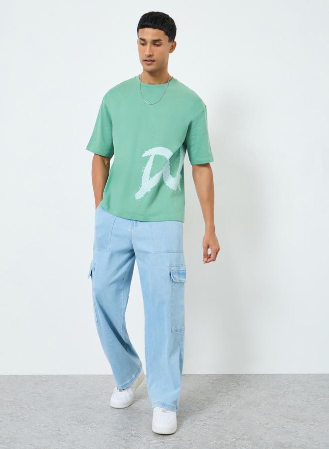Styli Men Green Graphic Print Oversized T-Shirt - Image 2