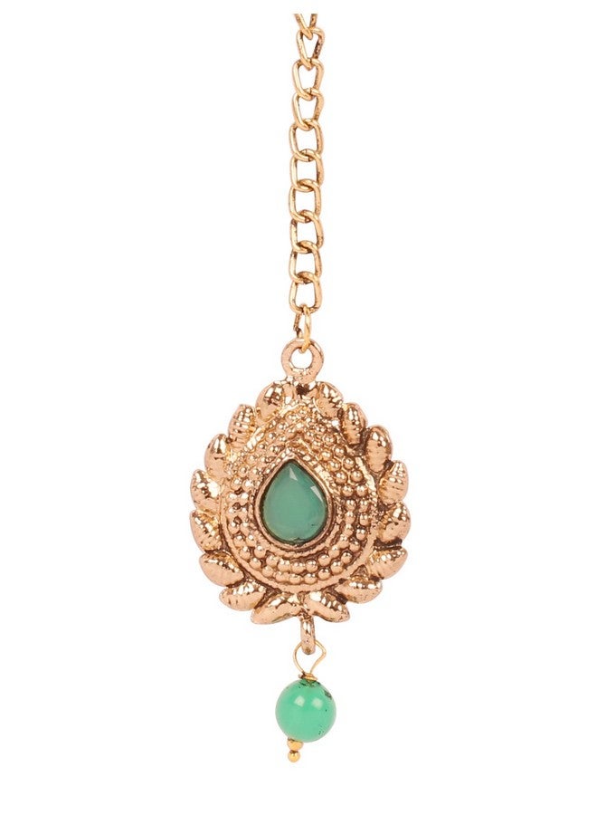 Touchstone New! Touchstone Indian Bollywood Traditional Grain Work Petals Patterns Studded Diamond Look Faux Emerald Designer Jewelry Mangtika Accessory in Antique Gold Tone for Women. - Image 1