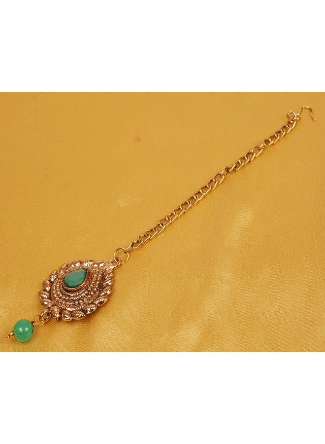 Touchstone New! Touchstone Indian Bollywood Traditional Grain Work Petals Patterns Studded Diamond Look Faux Emerald Designer Jewelry Mangtika Accessory in Antique Gold Tone for Women. - Image 4