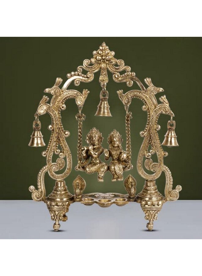 ARTVARKO Radha Krishna Jhula Diya with Hanging Bells Brass Radha Krishan Swing Statue Desiner Peacock Jhoola Kirtimukha Idol Murti for Home Décor Office Mandir Gift 13.5 Inch - Image 1