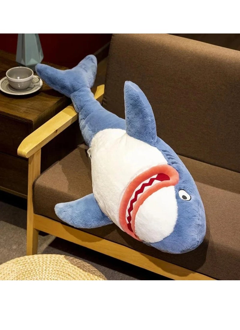 Magnolia Lipstick Shark: A soft pillow that adds a touch of fun to your children's room! It is distinguished by its ice blue color and its size is 100 cm  - Image 1