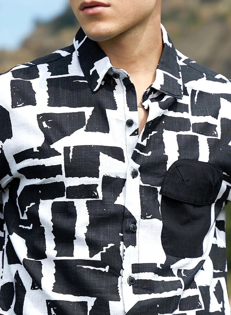 Campus Sutra Men's Obsidian Black & Cream White Imprint Oversized Shirt