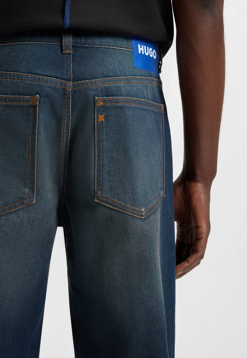 HUGO Dark Blue Tapered-fit jeans in blue stretch denim for Men | Best Price UAE