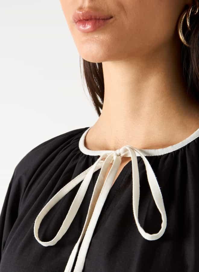 ايكونيك فستان ترابيز بتطريز زهور وياقة ربط من آيكونيك - Image 4