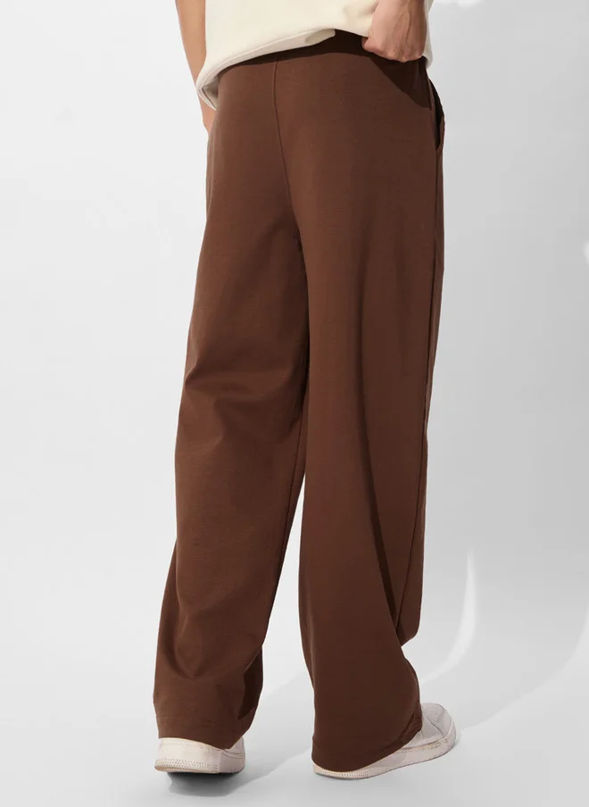 The Souled Store  The Souled Store Men Brown Solid Cotton Straight Fit Joggers  | Best Price UAE