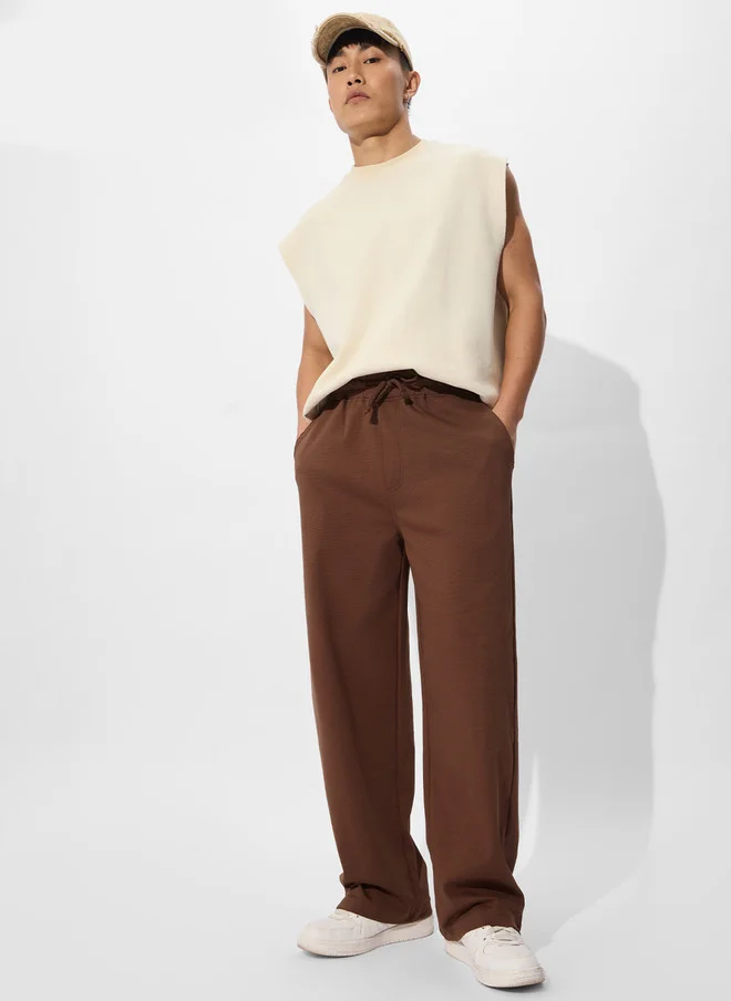 The Souled Store  The Souled Store Men Brown Solid Cotton Straight Fit Joggers  | Best Price UAE