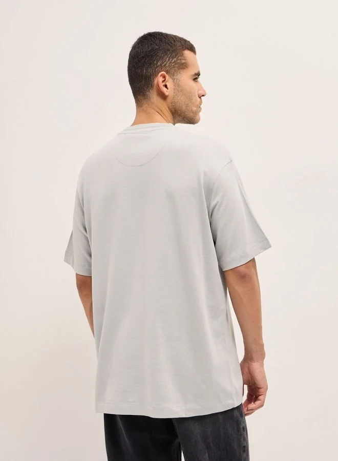 THE BEAR HOUSE  Men's Grey Pixel Art Graphic Printed Oversize Crew Neck T-shirt Perfect For Casual Wear, Gym, Travel, Or Layering Stylish And Versatile Essential For Every Wardrobe for Men | Best Price UAE