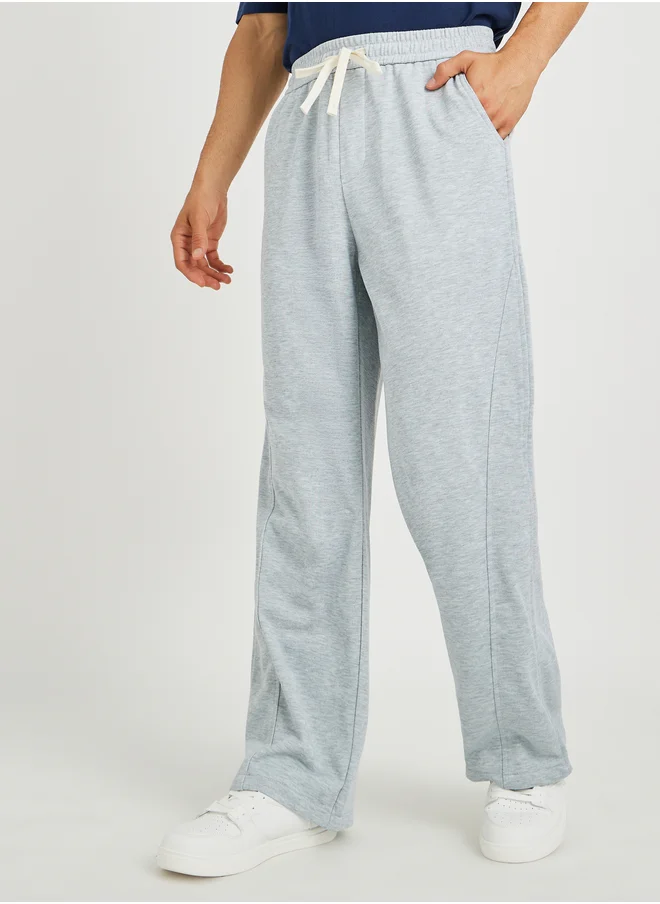 ستايلي Styli Men Grey Solid Relaxed Fit Open Hem Joggers with Side Panel Detail
