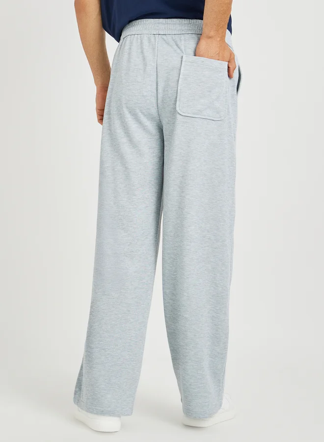 Styli Styli Men Grey Solid Relaxed Fit Open Hem Joggers with Side Panel Detail
