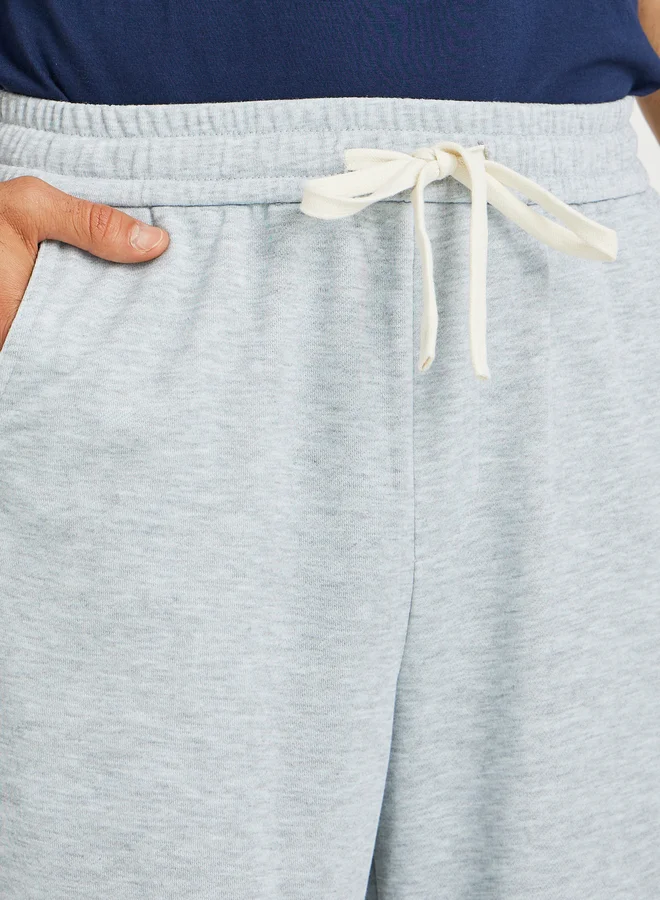 Styli Styli Men Grey Solid Relaxed Fit Open Hem Joggers with Side Panel Detail