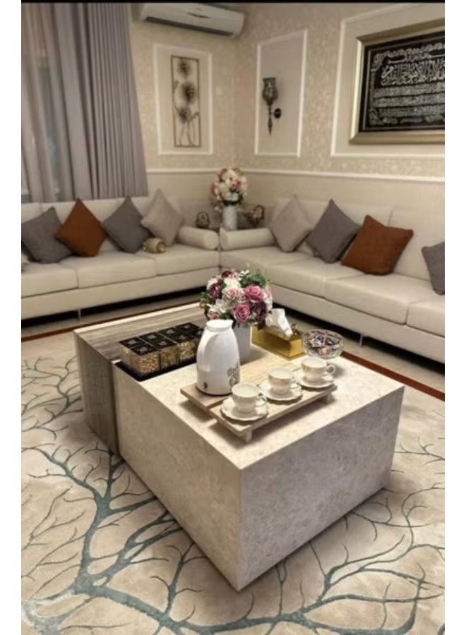 Modern square coffee table with a luxurious design – marble-effect wood top and sturdy frame – suitable for living rooms and majlis (sitting rooms).