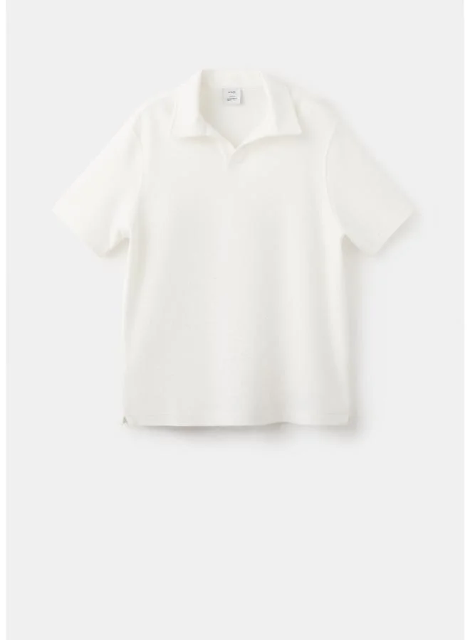 Mango Man  Regular-fit textured polo shirt for Men | Best Price UAE