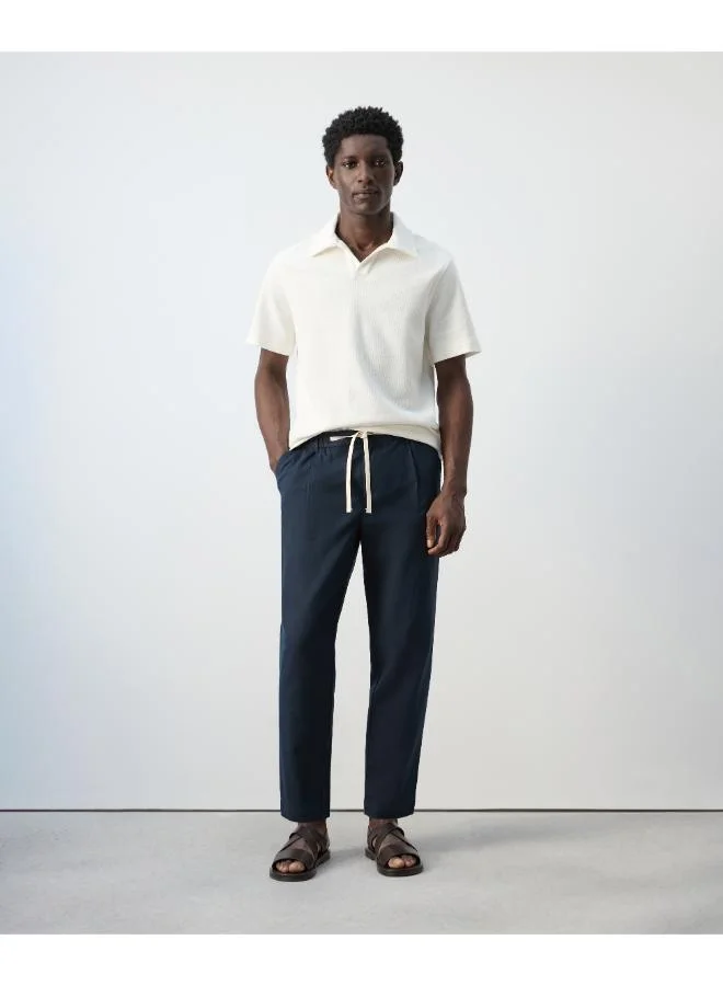Mango Man  Regular-fit textured polo shirt for Men | Best Price UAE