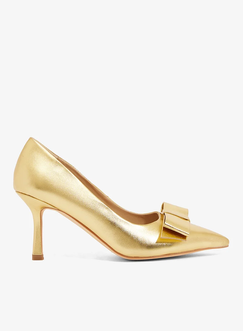 Gold metallic pump with side bow, pointed toe, mid heel