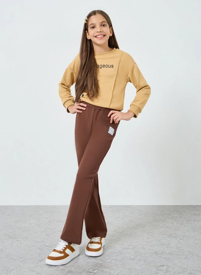 ستايلي ليغينغز للمراهقات بخصر مطاطي وتفاصيل شارة رمادية