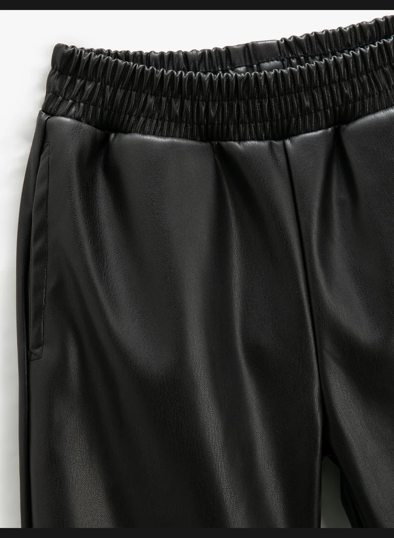 كوتون Faux Leather Jogger Trousers Elastic Waistband Pocket Detail