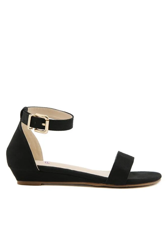 Sneak-a-Peek Solid Buckle Ankle Strap Open Toe Sandals by Styli