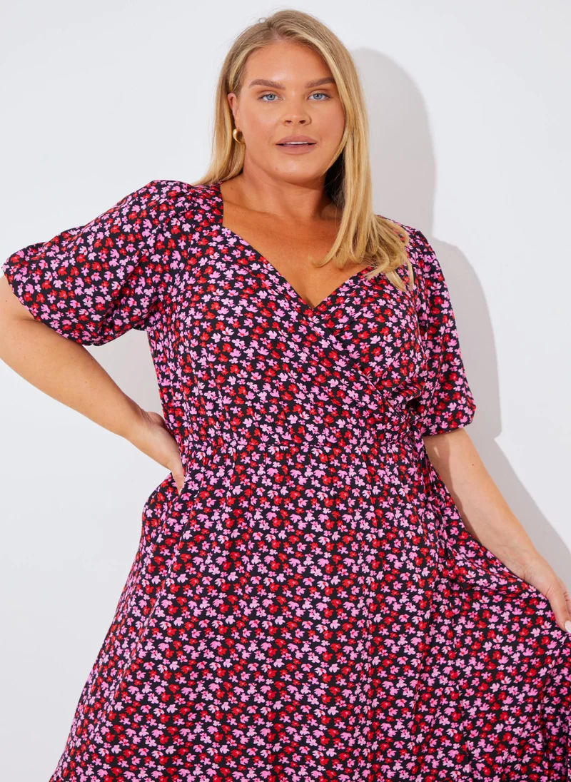 In the style Puff Sleeve Printed Wrap Dress