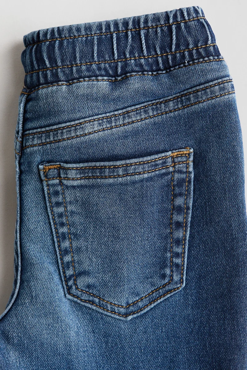 اتش اند ام بنطلون رياضي من قماش الدنيم القطني