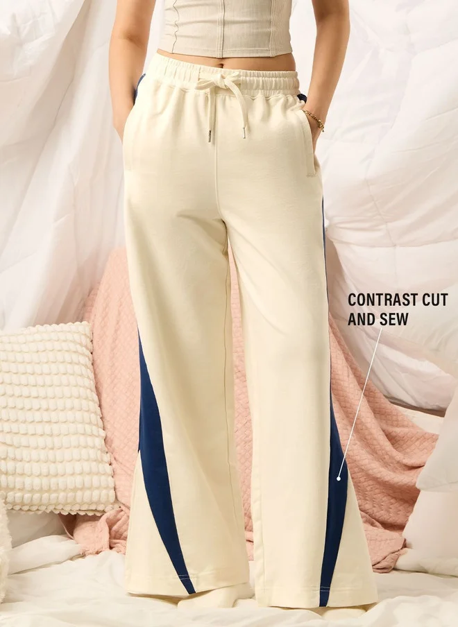 The Souled Store  The Souled Store Women Flared Fit Colourblocked Cream Joggers  | Best Price UAE