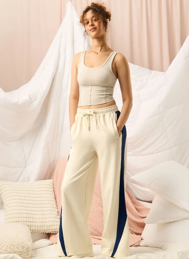 The Souled Store  The Souled Store Women Flared Fit Colourblocked Cream Joggers  | Best Price UAE