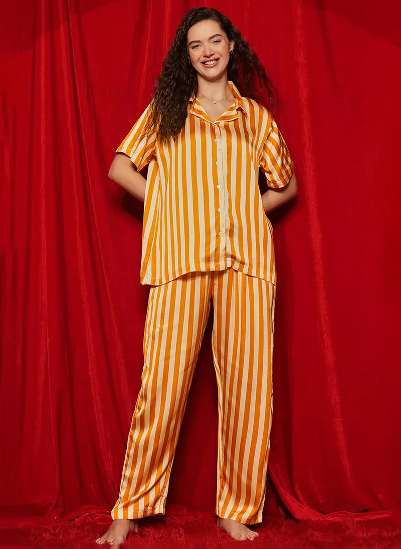 كلوفيا Clovia Striped Button-Down Korean Shirt & Pyjama Set in Orange Colour - Satin
