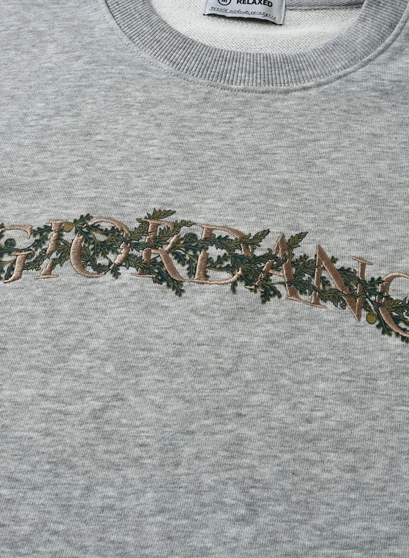 GIORDANO  Men’s Relaxed French Terry Crew Neck Graphic Sweater for Men | Best Price UAE