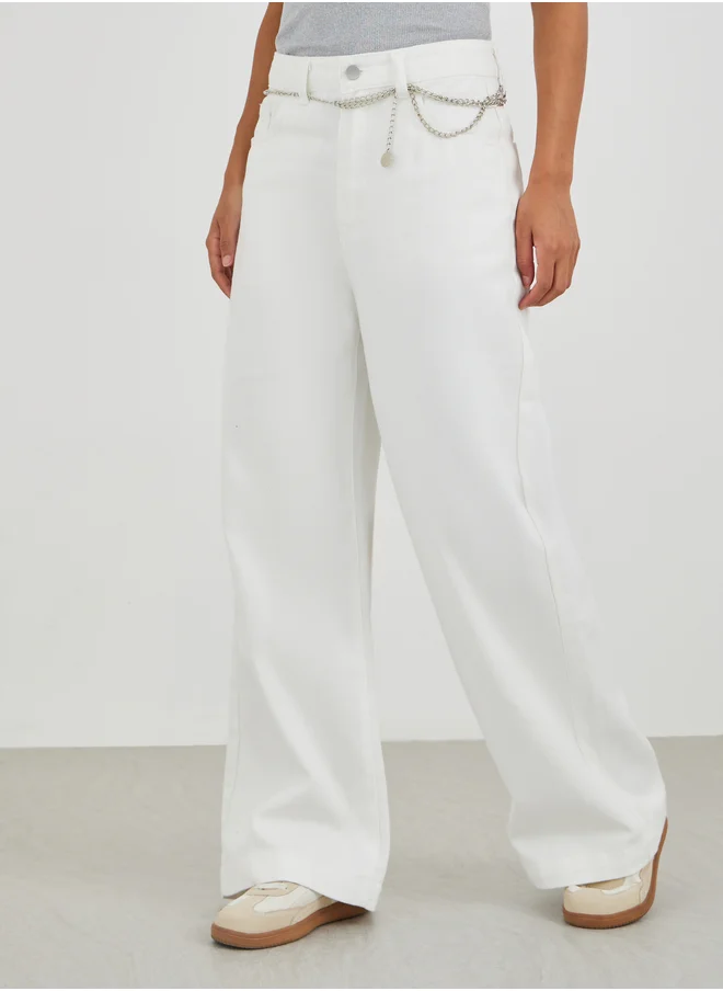 ستايلي Styli Solid Mid Rise Wide Leg Jeans with Chain Belt Detail