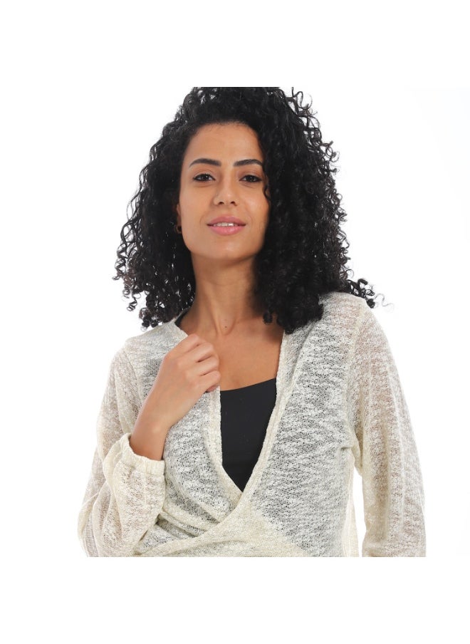 Women's wrap blouse with waist belt