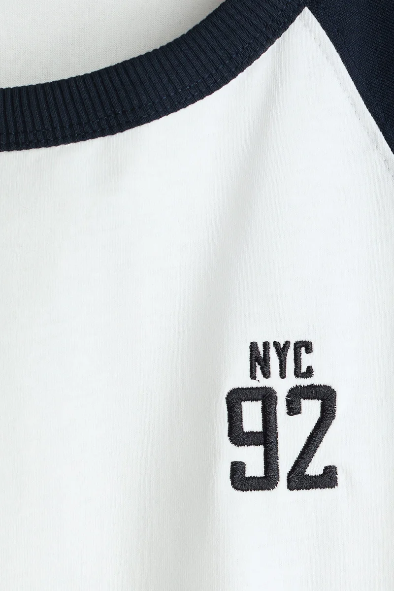 اتش اند ام تي-شيرت بقصة راغلان