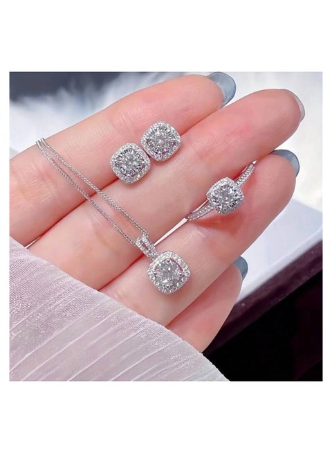 Luxury Jewelry Set for Women that includes a necklace, a pair of earrings, and a ring, all adorned with square-shaped cubic zirconia