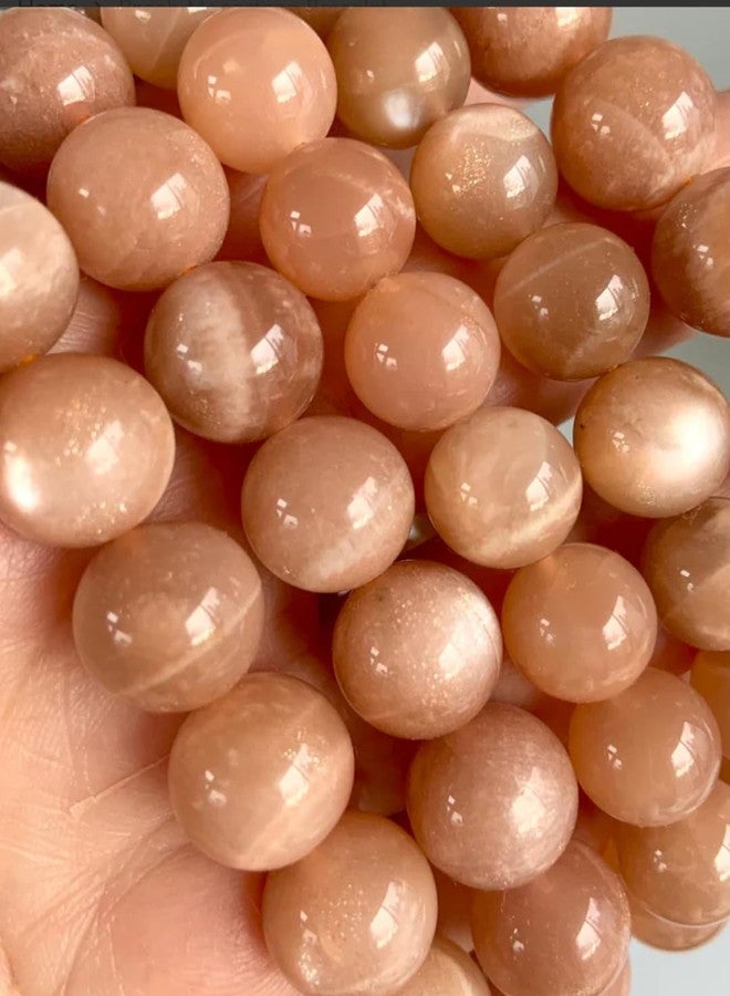 Agatesvibe سوار من حجر القمر الطبيعي بلون الخوخ من أغاتسفايب - سوار مطاطي بخرز كريستالي ناعم مستدير 8 مم للرجال والنساء، مجوهرات من الأحجار الكريمة العلاجية للتأمل، والريكي، والتوازن العاطفي، والارتداء اليومي (عبوة من قطعة واحدة) - Image 5