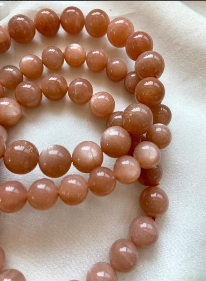 Agatesvibe سوار من حجر القمر الطبيعي بلون الخوخ من أغاتسفايب - سوار مطاطي بخرز كريستالي ناعم مستدير 8 مم للرجال والنساء، مجوهرات من الأحجار الكريمة العلاجية للتأمل، والريكي، والتوازن العاطفي، والارتداء اليومي (عبوة من قطعة واحدة) - Image 4