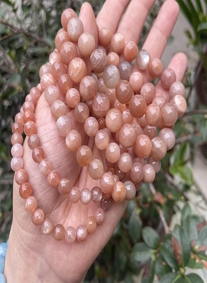 Agatesvibe سوار من حجر القمر الطبيعي بلون الخوخ من أغاتسفايب - سوار مطاطي بخرز كريستالي ناعم مستدير 8 مم للرجال والنساء، مجوهرات من الأحجار الكريمة العلاجية للتأمل، والريكي، والتوازن العاطفي، والارتداء اليومي (عبوة من قطعة واحدة) - Image 3