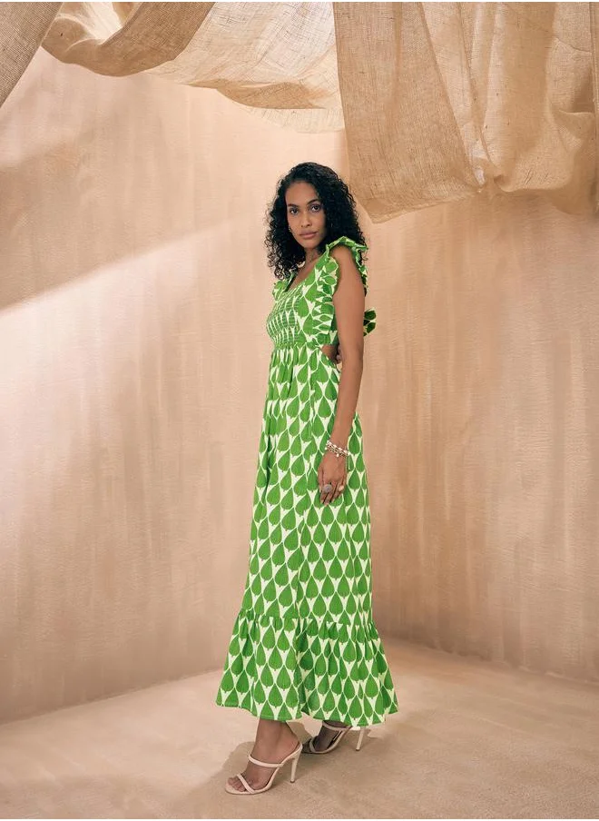 SASSAFRAS All Over Print Tie-Up Back A-Line Maxi Dress by Styli