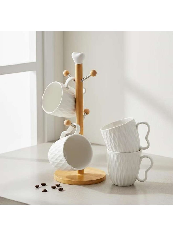 Pan Home 4-Piece White Porcelain Mug Set with Tree - Image 1