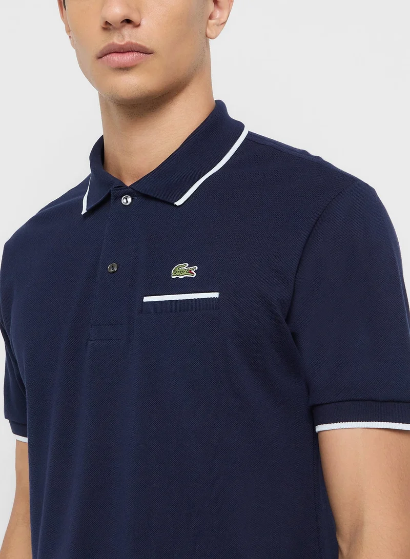 LACOSTE navy Classic Fit  Pocket Detail Piqué Polo for Men | Best Price UAE