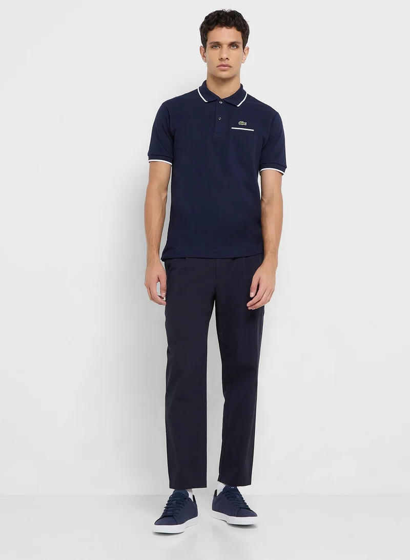 LACOSTE navy Classic Fit  Pocket Detail Piqué Polo for Men | Best Price UAE