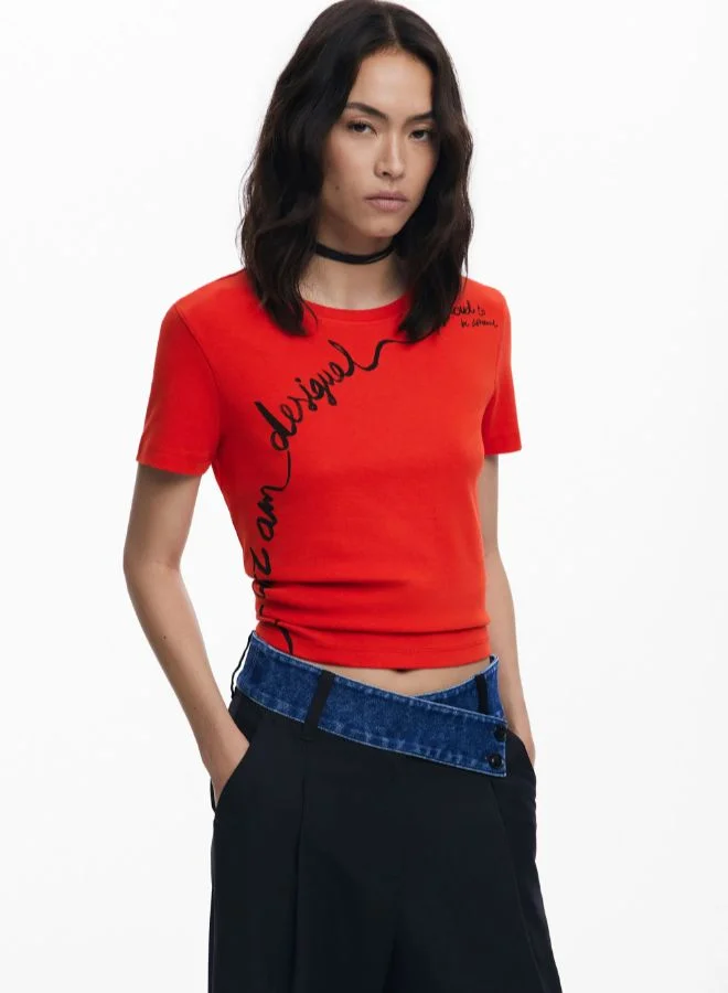 T-shirt with embroidered phrase